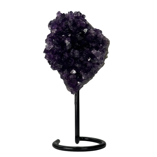 Donkerpaarse amethist cluster op voet