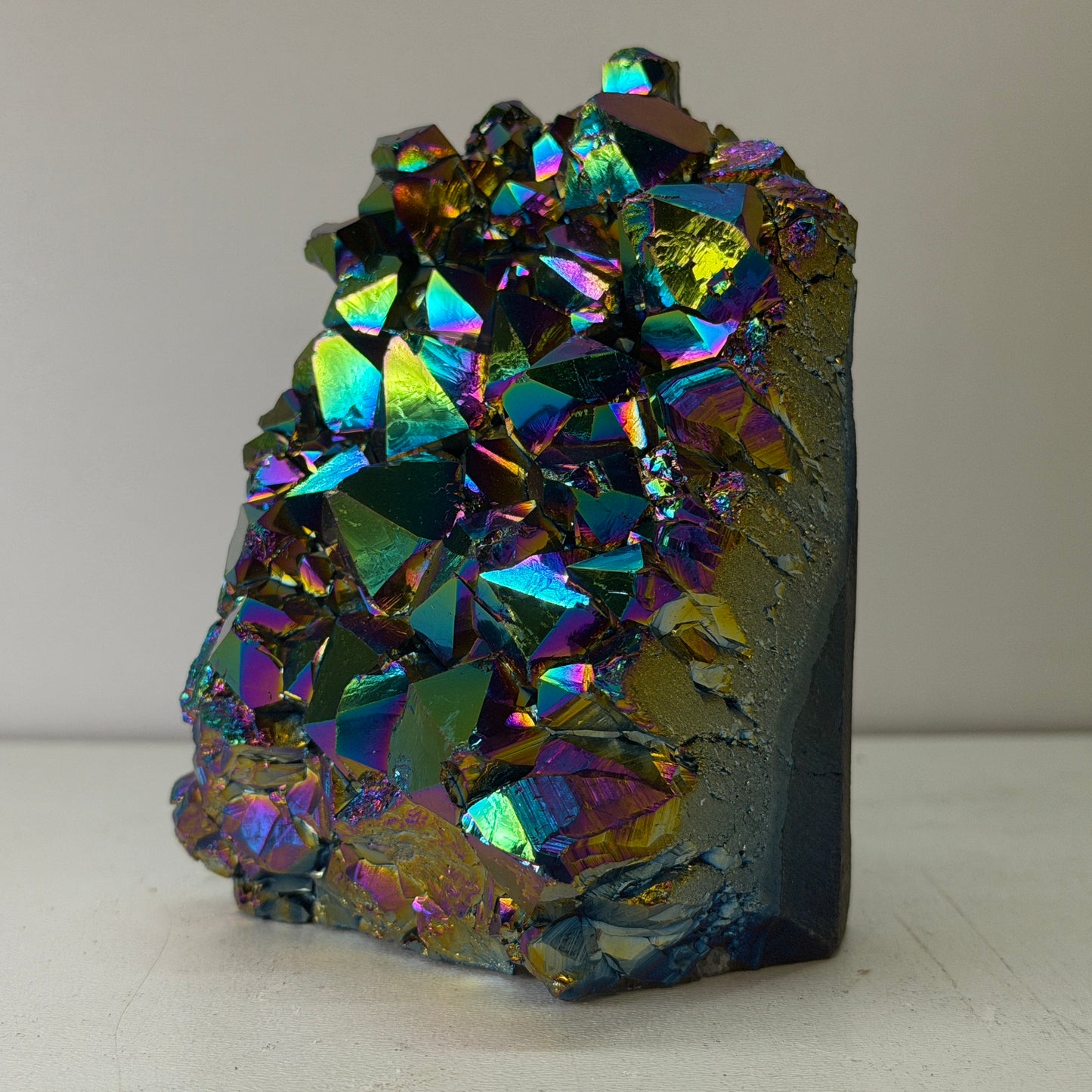 Rainbow Titanium Kwarts Cut Base