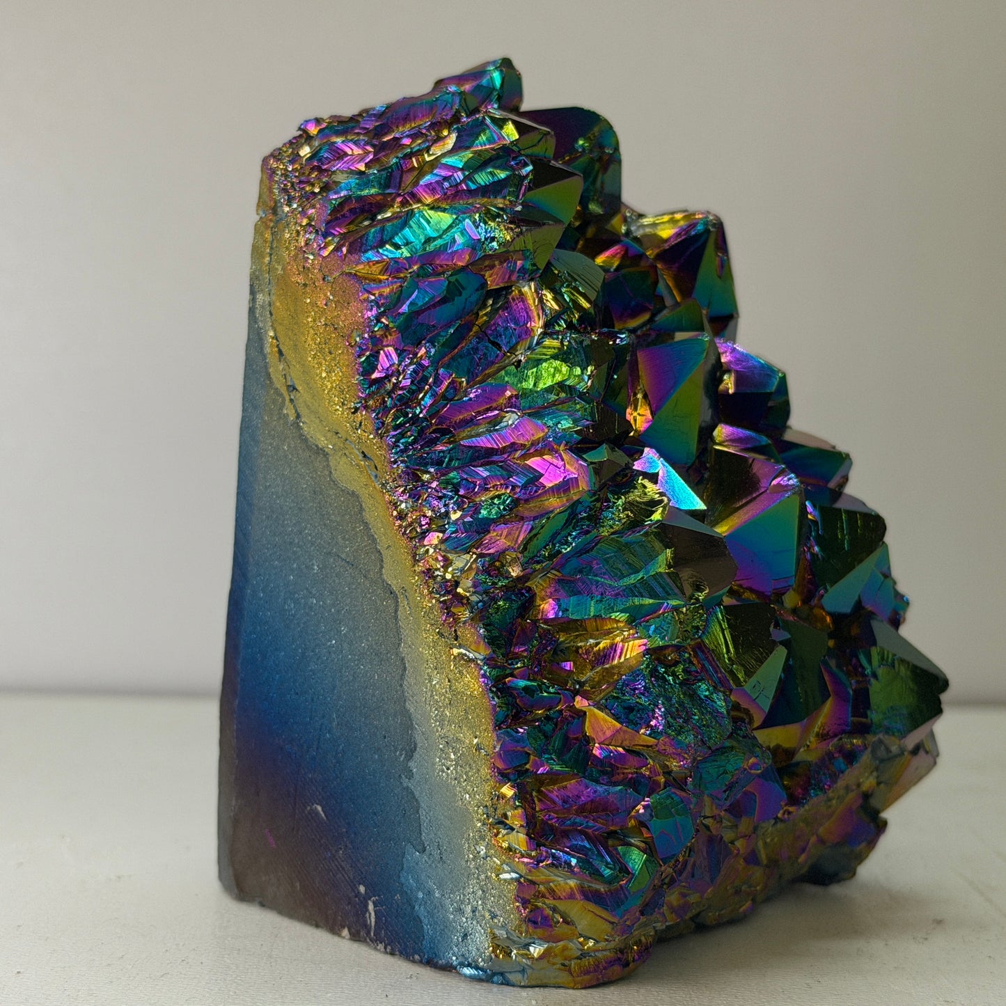 Rainbow Titanium Kwarts Cut Base