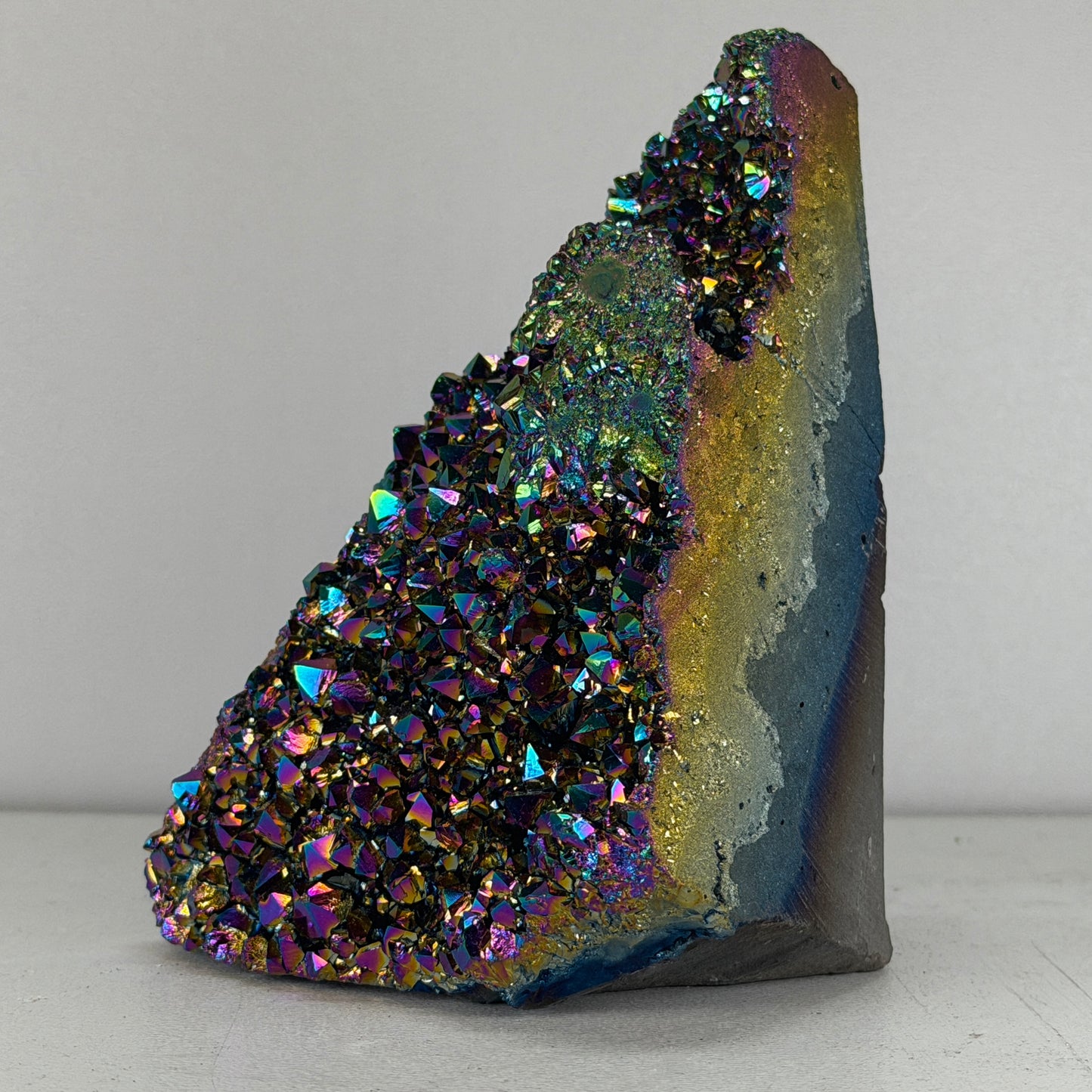 Rainbow Titanium Kwarts Cut Base