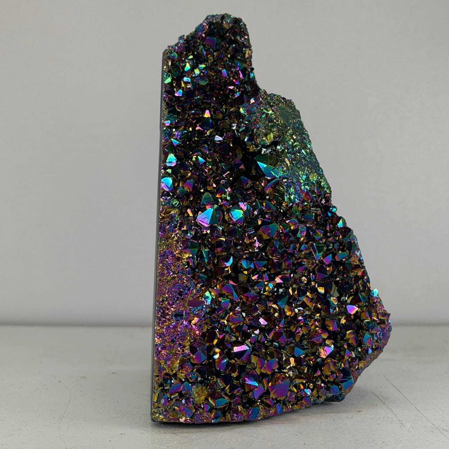 Rainbow Titanium Kwarts Cut Base